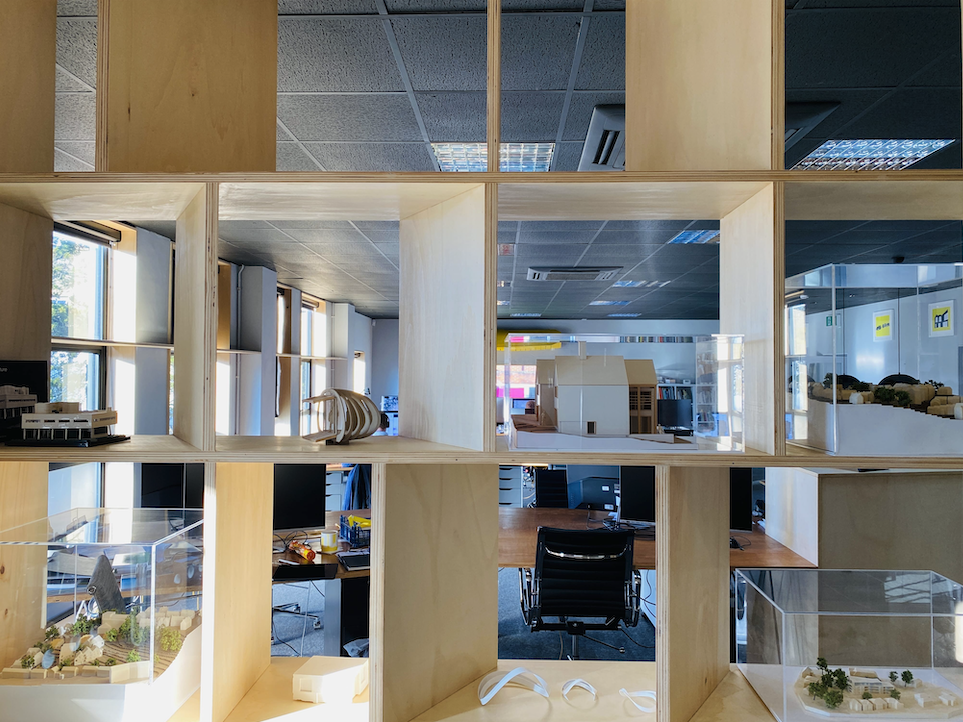 https://www.snugarchitects.co.uk/assets/site/Snug_Office_Eco_Glulam_shelves.png